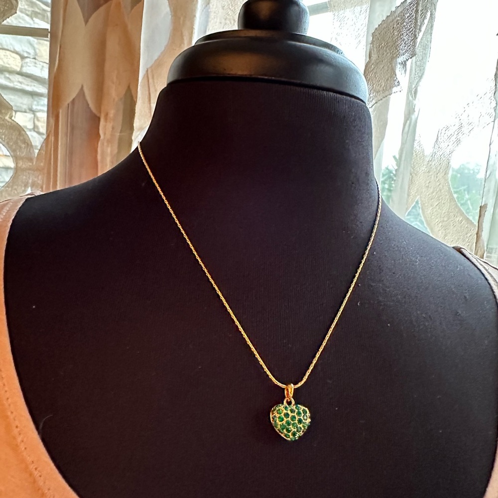 Joan Rivers green gem heart necklace
